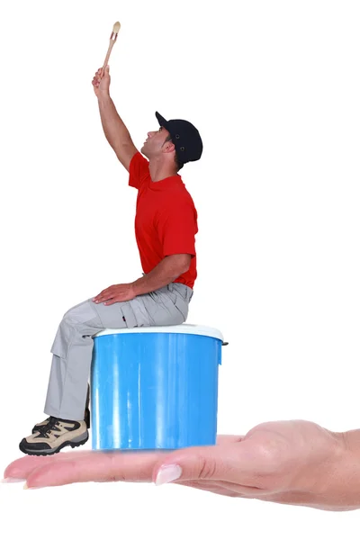 Painter on blue paint can — Stock Photo, Image