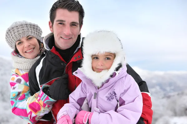 Family in snowsuits — Stock Photo, Image