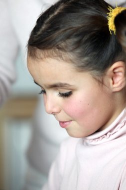 Closeup of a little girl's face clipart