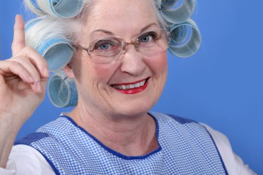 Old woman in rollers clipart