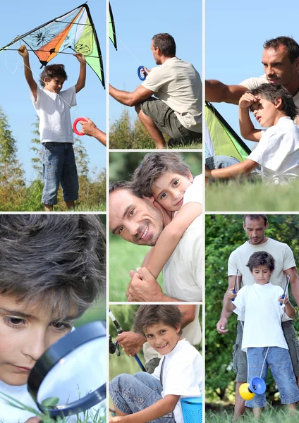 Man och lilla pojke leker med kite — Stockfoto