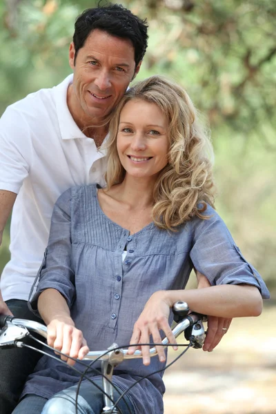 Couple in a bike — Stock Photo, Image