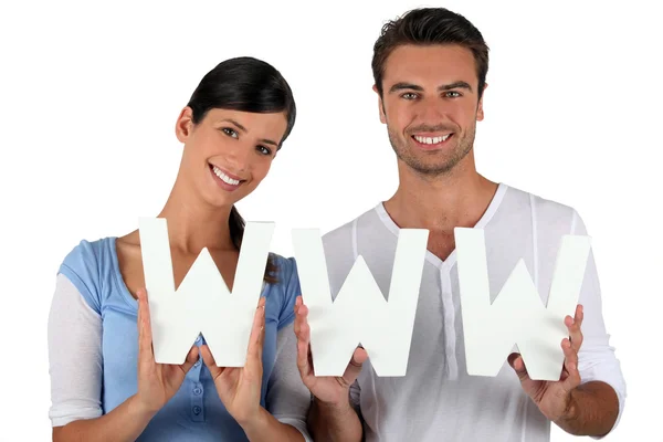 Man and woman holding letters — Stock Photo, Image