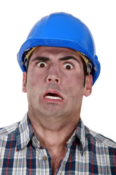 Schockierter Bauarbeiter mit Ruß bedeckt — Stockfoto