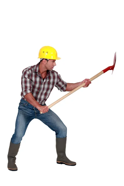 Travailleur de la construction avec une pelle — Photo