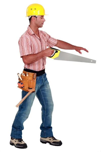 Joiner holding a saw — Stock Photo, Image