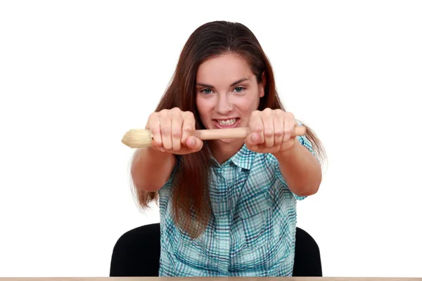 Kız holding boya fırçası — Stok fotoğraf