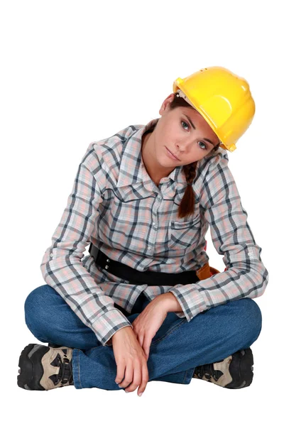 Hantverkerska ser trött och ledsen — Stockfoto