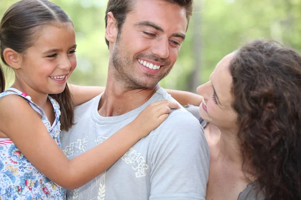 Family enjoying day out at the park — Stock Photo, Image