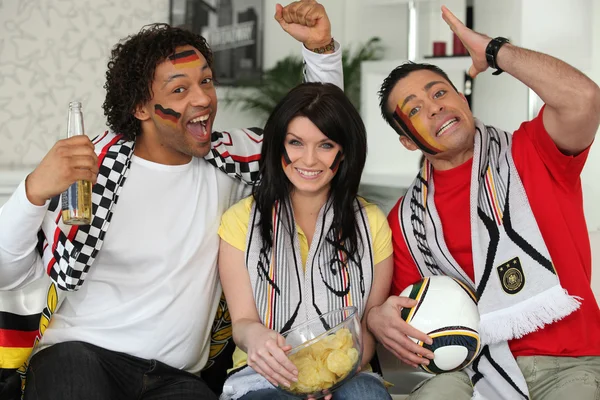 Football fans cheering on the German team — Stock Photo, Image