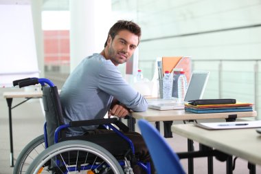 Businessman in a wheelchair clipart