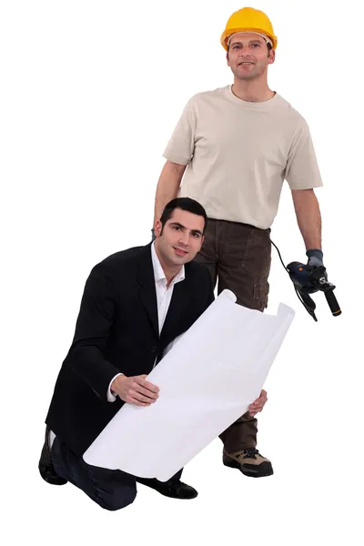 Hantverkare och affärsman poserar tillsammans — Stockfoto