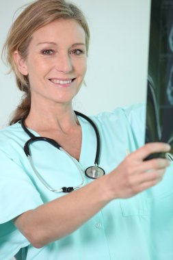 Nurse holding radiography clipart