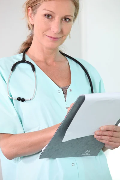 Sjuksköterska företagsakt — Stockfoto