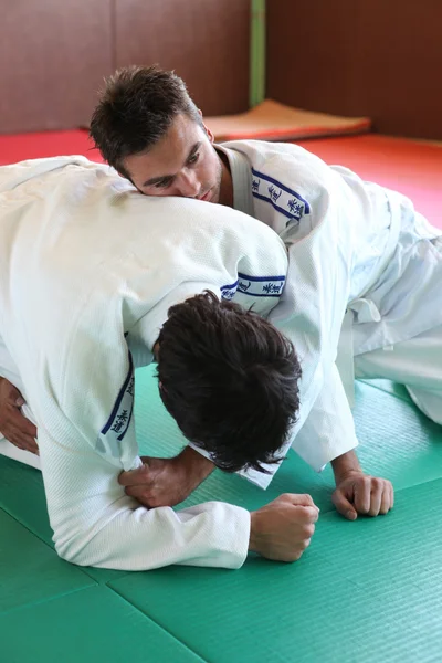 Judo hold down. — Stock Photo, Image
