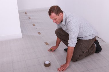 Man covering floor clipart
