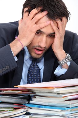 Stressed young businessman clipart