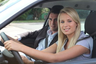 Girl in driving lesson clipart