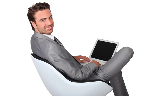Businessman with laptop — Stock Photo, Image