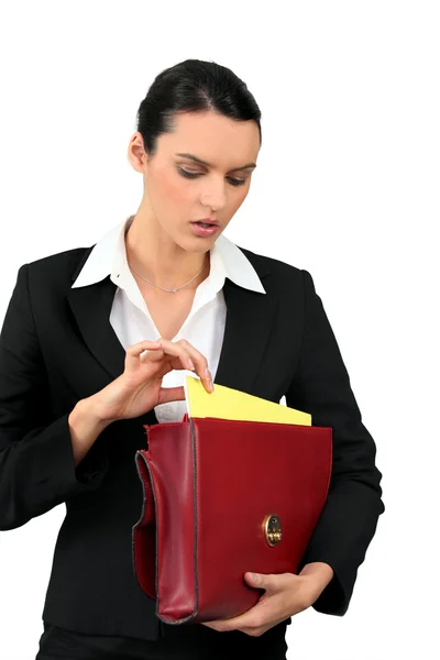 Businesswoman with leather briefcase — Stock Photo, Image