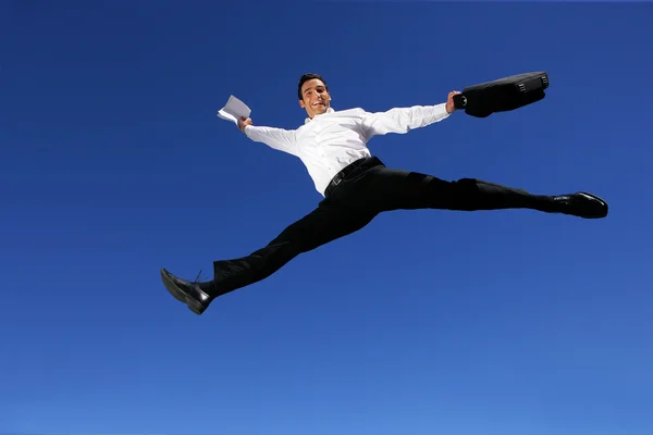 空気を通って跳躍の実業家 — ストック写真