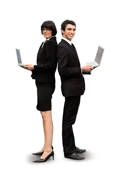 Executivos com laptops em pé sobre fundo branco — Fotografia de Stock