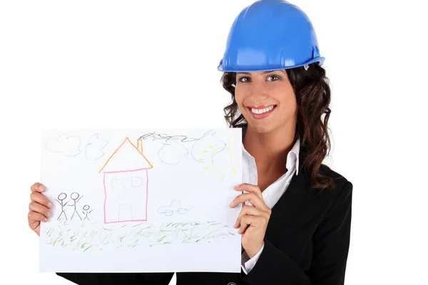 Architect businesswoman holding a drawing — Stock Photo, Image