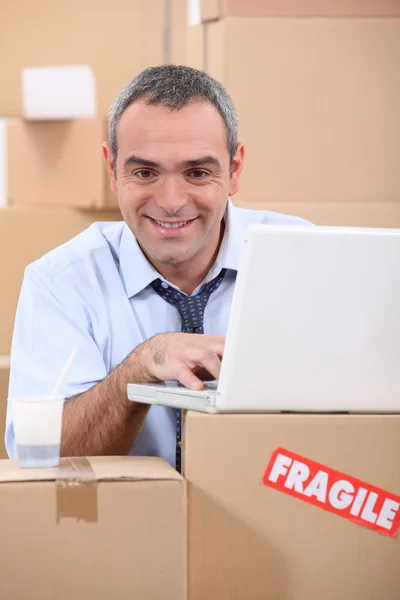 Man purchasing new furniture on the internet — Stock Photo, Image