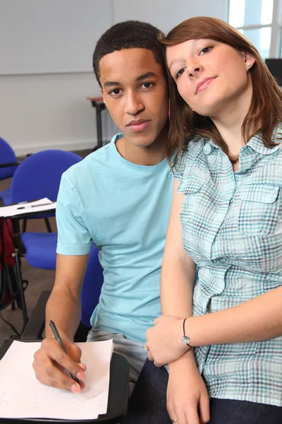 Girl and boy in classroom — Stock Photo, Image