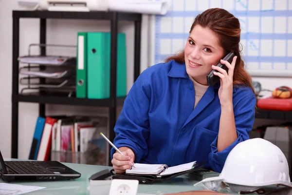 Corporate woman answering phone — Stock Photo, Image
