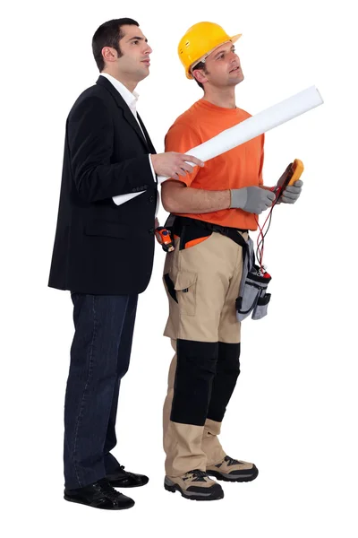 An architect and his electrician. — Stockfoto