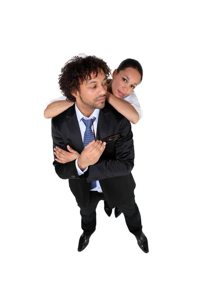 Studio shot of a businessman and his girlfriend — Stock Photo, Image