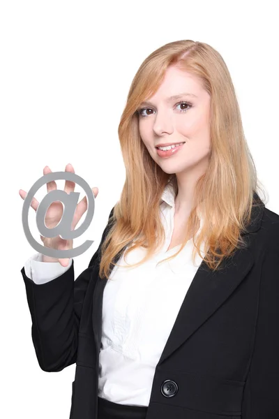 Woman holding at symbol — Stock Photo, Image