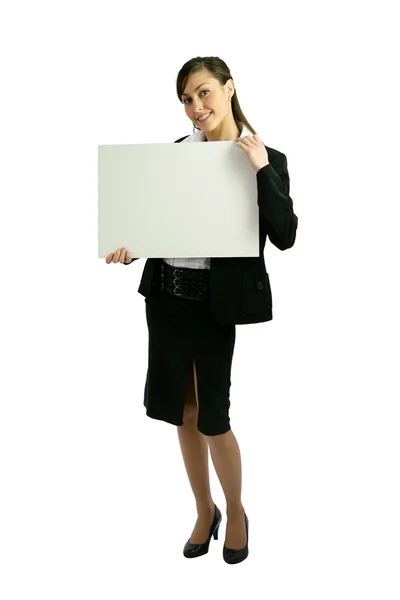 Empresária segurando cartaz em branco — Fotografia de Stock