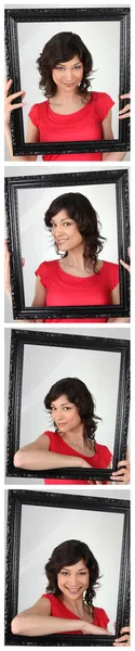 Foto tira de mujer sosteniendo marco vacío —  Fotos de Stock