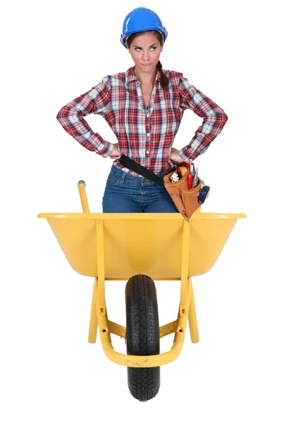 Annoyed girl in a barrow isolated on white background — Stock Photo, Image