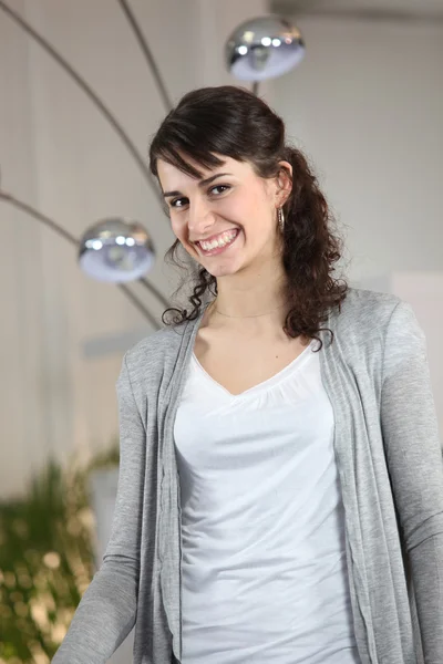 Young brunette woman smiling — Stock Photo, Image