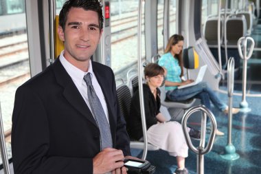 Ticket collector in tramway clipart