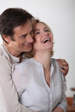 Portrait of laughing loving couple clipart