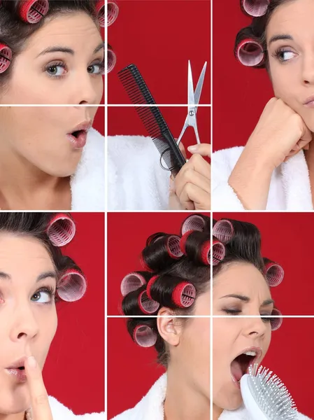 Mulher em roupão de banho com encrespadores de cabelo — Fotografia de Stock