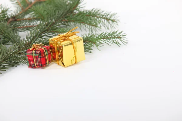 Branch of a Christmas tree with decorations — Stock Photo, Image