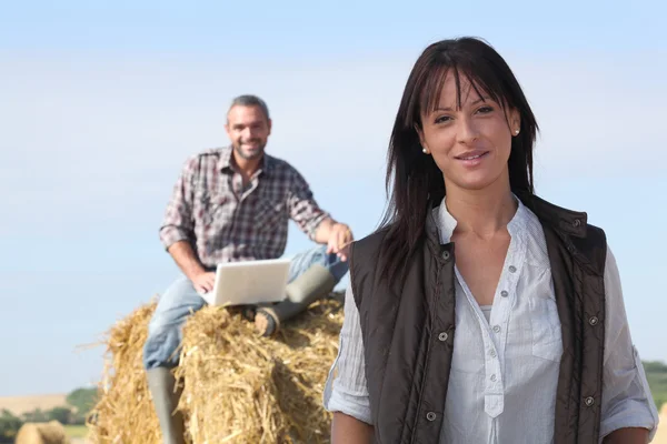 Happy couple relaxing in their farm — Stock Photo, Image