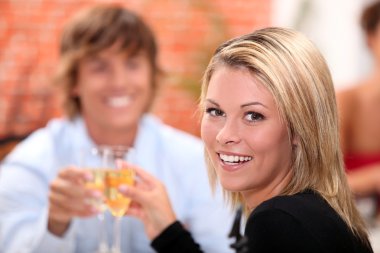 Portrait of a woman toasting clipart