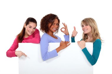 Women enthusiastically holding up a blank sign clipart