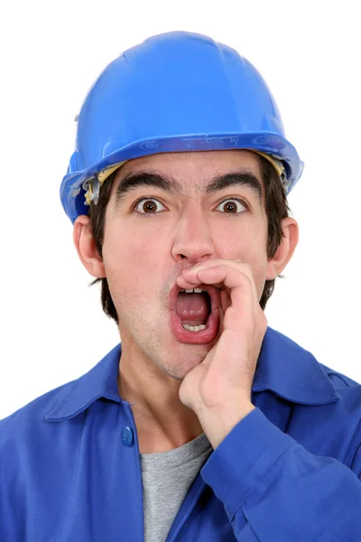 Un obrero de la construcción gritando . —  Fotos de Stock