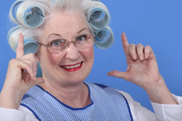 Granny with her hair in rollers — Stock Photo, Image