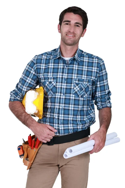 Male builder with plans — Stock Photo, Image