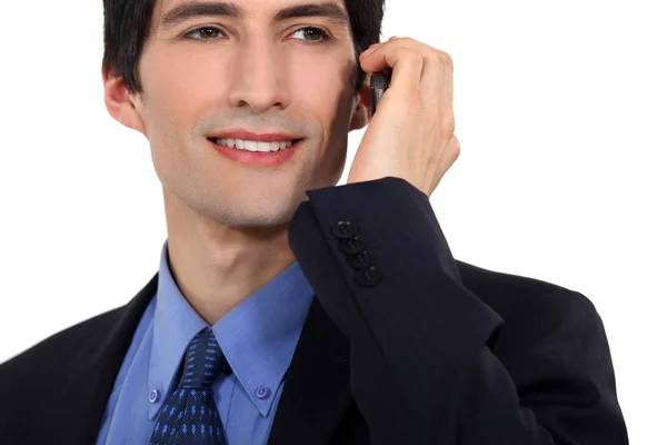 Young businessman using mobile telephone — Stock Photo, Image