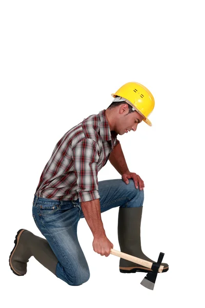 Craftsman working with an ax — Stock Photo, Image