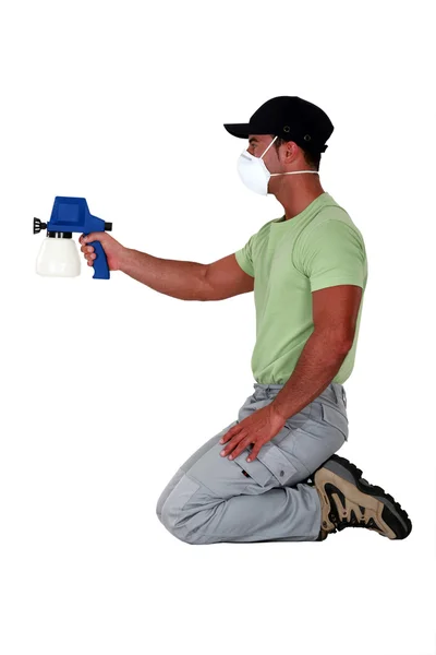 A painter using a spray gun. — Stock Photo, Image